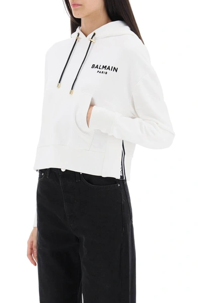 Shop Balmain Cropped Sweatshirt With Flocked Logo Print
