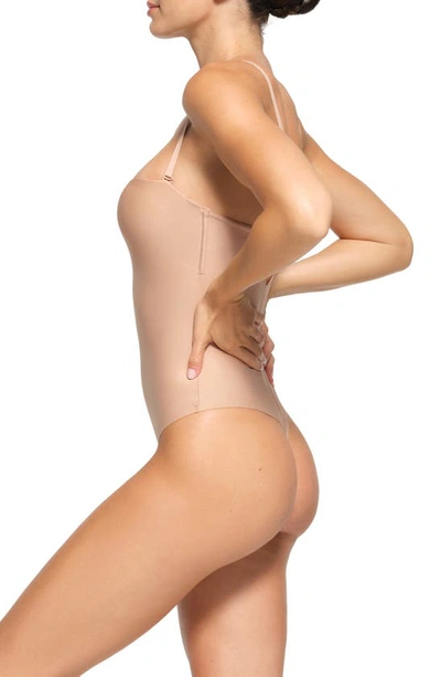 Shop Skims Molded Underwire Thong Shaper Bodysuit In Clay