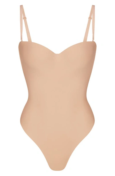 Shop Skims Molded Underwire Thong Shaper Bodysuit In Clay