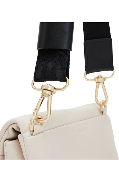Shop Allsaints Ezra Logo Strap Leather Crossbody Bag In Desert White