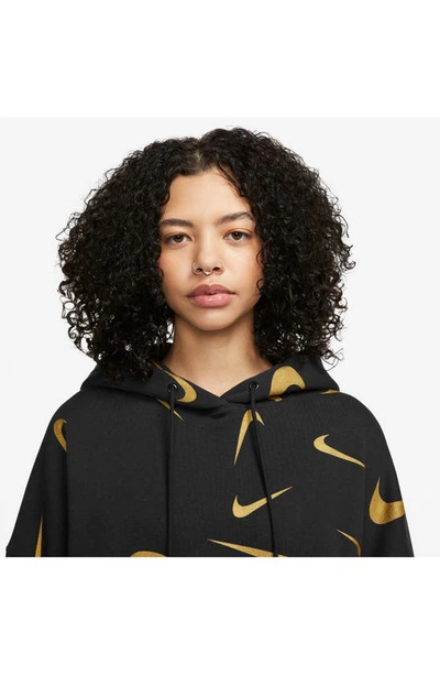 Shop Nike Sportswear Print Hoodie In Black/ Bronzine