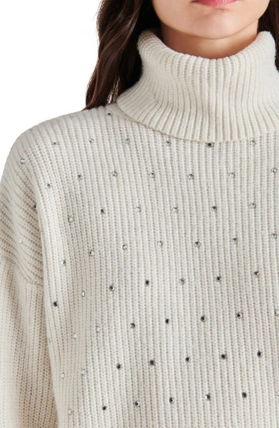 Shop Steve Madden Astro Embellished Turtleneck Sweater In Whisper White