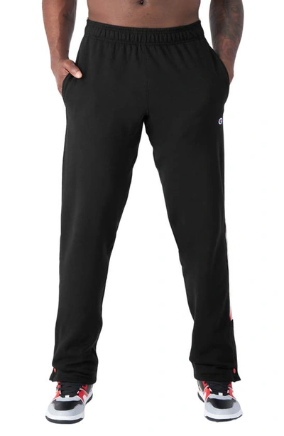 Shop Champion Powerblend Taped Snap Away Pants In Black