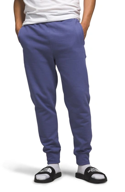 Shop The North Face Heritage Patch Jogger Sweatpants In Cave Blue