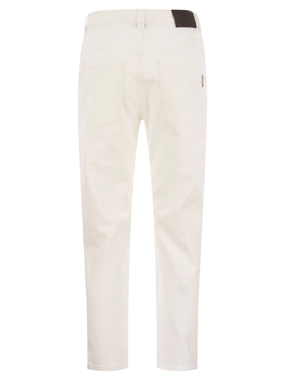 Shop Brunello Cucinelli Baggy Trousers In Garment Dyed Comfort Denim With Shiny Tab