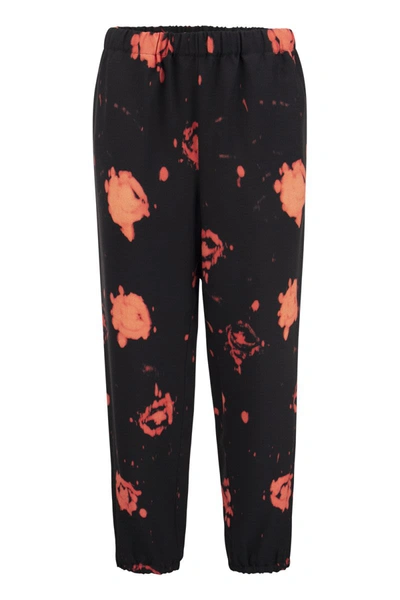 Shop Marni Trousers With Faded Roses Print