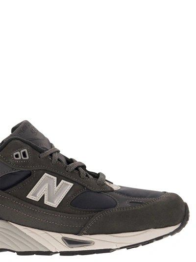 Shop New Balance 991 Sneakers Lifestyle