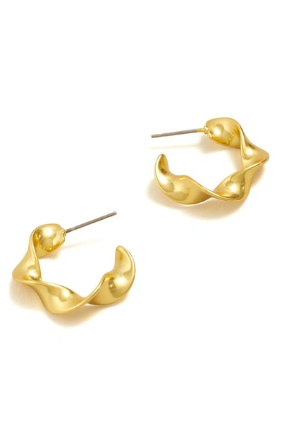 Shop Madewell Twisted Ribbon Hoop Earrings In Vintage Gold