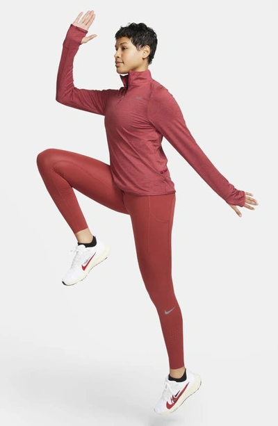 Shop Nike Dri-fit Swift Element Uv Quarter Zip Running Pullover In Noble Red/ Cedar/ Heather