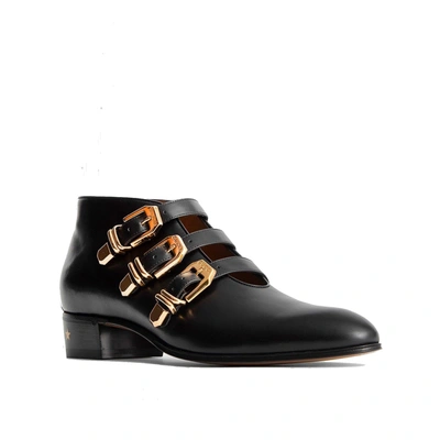 Shop Gucci Leather Ankle Boots
