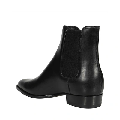 Shop Saint Laurent Chelsea Leather Boots