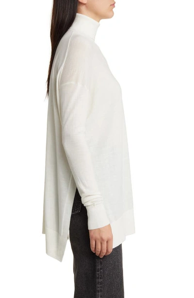 Shop Allsaints Gala Merino Wool Turtleneck Sweater In Chalk White