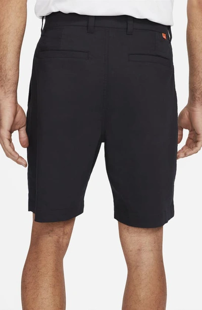 Shop Nike Golf Dri-fit Uv Flat Front Chino Golf Shorts In Black