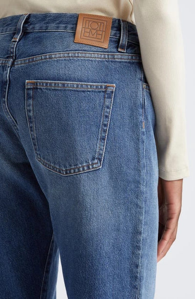 Totême Twisted Seam High-rise Straight-leg Organic-denim Jeans In Blue