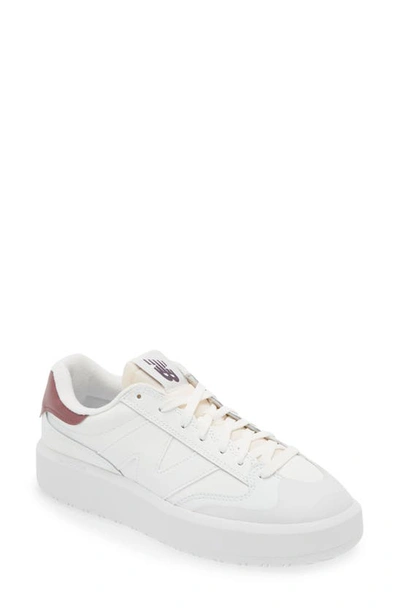 Shop New Balance Gender Inclusive Ct302 Tennis Sneaker In White/ Washed Burgundy