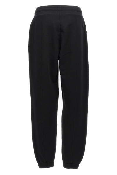 Shop Moncler Women Logo Patch Sweatpants In Black