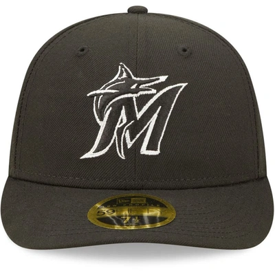 Shop New Era Miami Marlins Black & White Low Profile 59fifty Fitted Hat