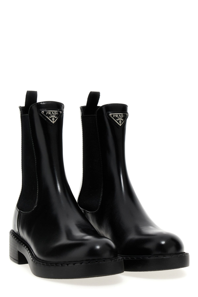 Shop Prada Women Triangle Logo Ankle Boots In Black