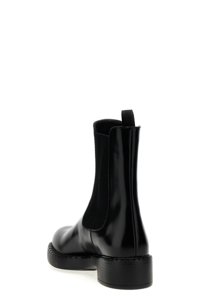 Shop Prada Women Triangle Logo Ankle Boots In Black