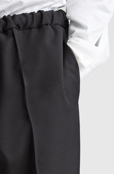 Shop Jil Sander Relaxed Fit Elastic Waist Tapered Leg Ankle Trousers In Black