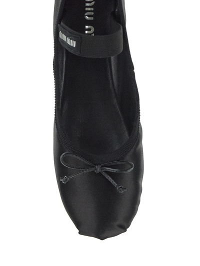 Shop Miu Miu Satin Ballerinas In Black