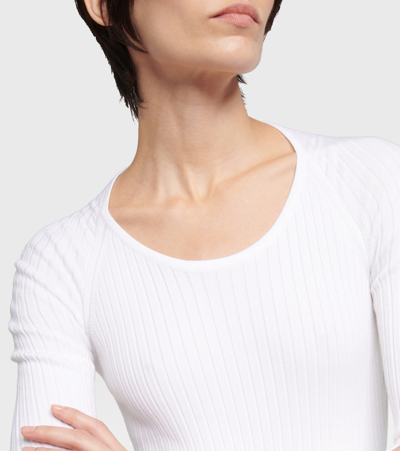Shop Alaïa Ribbed-knit Bodysuit In White