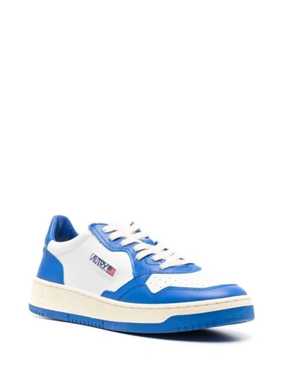Shop Autry Blue And White 'medalist' Low Top Sneakers In Cow Leather