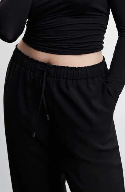 Shop Mango Flowy Drawstring Ankle Pants In Black