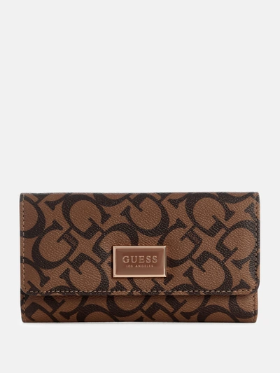Shop Guess Factory Abree Logo Slim Clutch Wallet In Brown