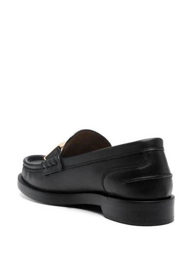 Shop Fendi Women Ff Logo-plaque Leather Loafers In Black