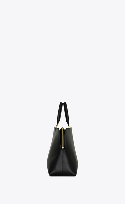 Shop Saint Laurent Women Sac De Jour Leather Bowling Bag In Black