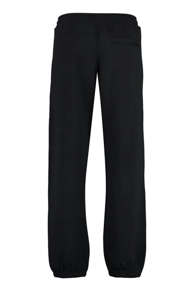 Shop Moschino Logo Detail Cotton Track-pants In Black