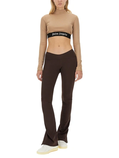 Shop Palm Angels Flared Leggings With Sweetheart Waist In Brown