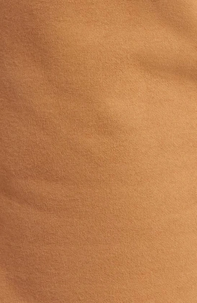 Beyond Yoga On The Go Wide Leg Flare Pants In Toffee