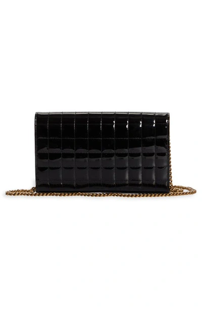 Shop Saint Laurent Cassandre Quilted Patent Leather Envelope Wallet On A Chain In Nero