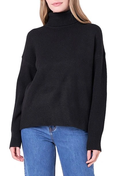 Shop English Factory Notch Hem Turtleneck Sweater In Black
