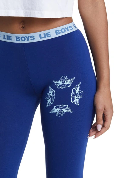 Shop Boys Lie Head Over Heels Graphic Flare Leg Yoga Pants In Blue