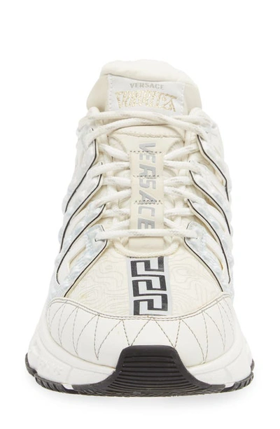 Shop Versace Trigreca Low Top Sneaker In White Gold