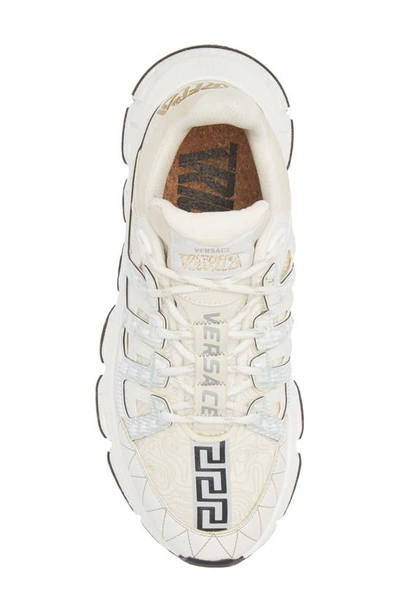 Shop Versace Trigreca Low Top Sneaker In White Gold