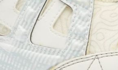 Shop Versace Trigreca Low Top Sneaker In White Gold