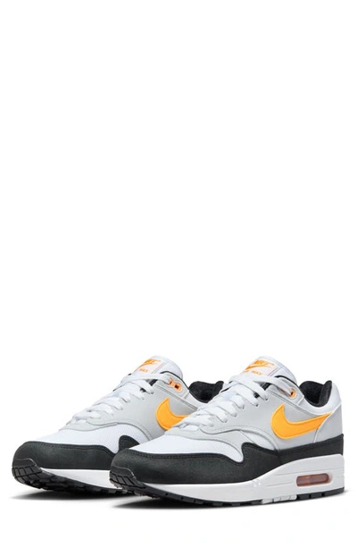 Shop Nike Air Max 1 Sneaker In White/ University Gold/ Black