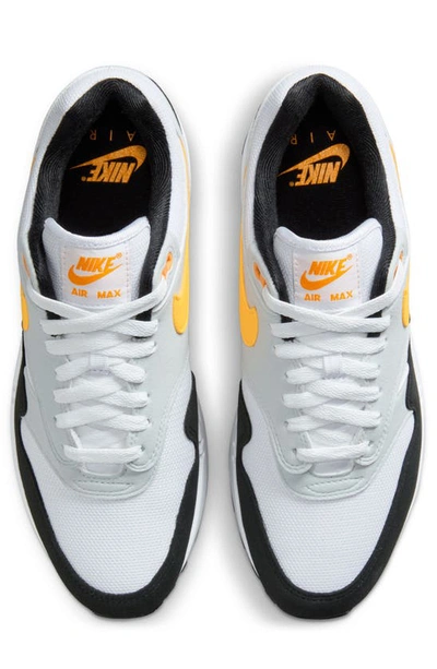 Shop Nike Air Max 1 Sneaker In White/ University Gold/ Black