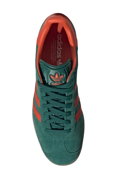 Shop Adidas Originals Gazelle Sneaker In Green/ Preloved Red/ Gum