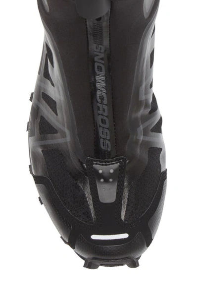 Shop Salomon Snowcross Waterproof Running Shoe In Black/ Black/ Magnet
