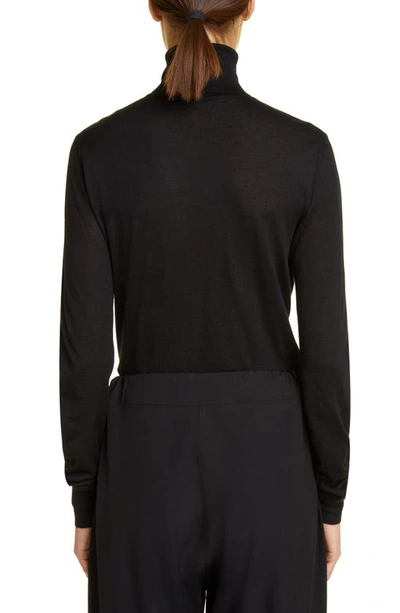 The Row Heva Turtleneck Jumper In Black
