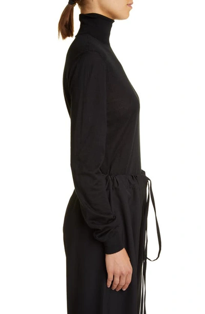 The Row Heva Turtleneck Jumper In Black
