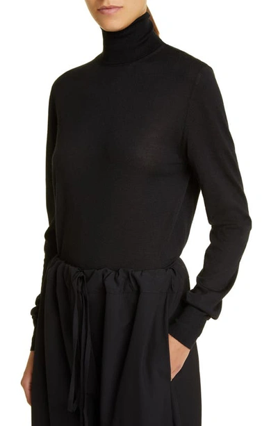 The Row Heva Turtleneck Jumper In Black