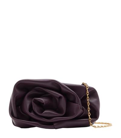 Shop Burberry Leather Rose Clutch In Purple