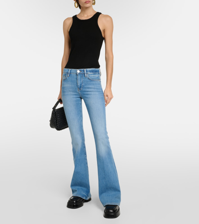 Shop Frame Le High Flare Flared Jeans In Blue