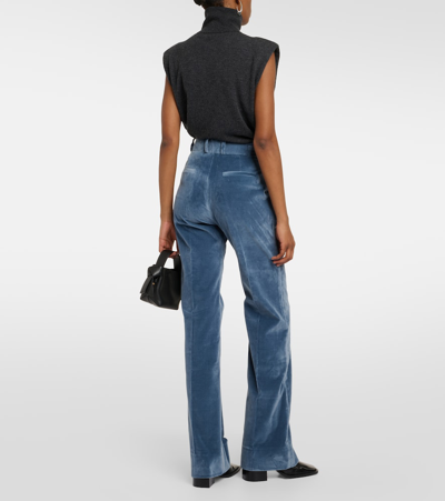 Shop Frame The Slim Stacked Velvet Pants In Blue